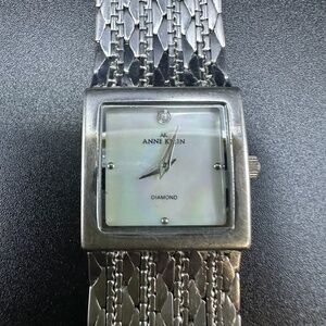 Anne Klein Women’s Silver-Tone Bracelet Watch – Mother-of-Pearl Dial + Genuine D